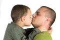 Father kissing his son Royalty Free Stock Photo