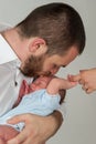 Father kissing his son on the forehead