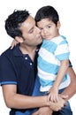 Father kissing his son Royalty Free Stock Photo