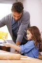 Father, kitchen and child hands baking, helping and dough with flour on counter table, parent together and smile. Family Royalty Free Stock Photo