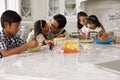 Father Leaving For Work After Family Breakfast In Kitchen Royalty Free Stock Photo