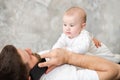 Father talks by phone and play with baby Royalty Free Stock Photo