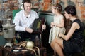 Father listens to old radio and mother with little daughter Royalty Free Stock Photo