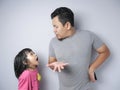 Father and Little Baby Daughter Arguing Royalty Free Stock Photo