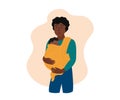 Father and little baby in sling. African american person man holding newborn in carrier. Happy dad and child wrapped in