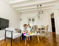 Father and little boy playing with toys in the room Royalty Free Stock Photo