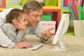 Father and little daughter with computer Royalty Free Stock Photo