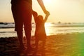 Father and little daughter learning to walk at Royalty Free Stock Photo