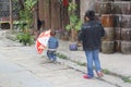 Father and little son walk in the ancient streets of Daxu,Guilin, China