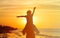 Father and little son having fun at sunset Royalty Free Stock Photo