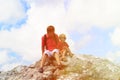 Father and little son travel hiking in mountains Royalty Free Stock Photo