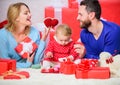 Father, mother and doughter child. Valentines day. Red boxes. Love and trust in family. Bearded man and woman with Royalty Free Stock Photo