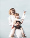 Father mother and his son playing outdoors. Summer ration. Cute little boy is holding paper airplane. Happy family Royalty Free Stock Photo