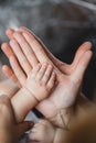 Father and Mother Holding Newborn Kid. Royalty Free Stock Photo