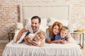 Father and mother hugging their kids Royalty Free Stock Photo