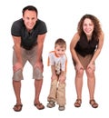 Father, mother and son look having bent down