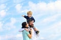 Father mother and son in the park. Freedom to Dream - Joyful Boy Playing With Paper Airplane. Family Time. Parenting Royalty Free Stock Photo