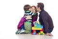 Father, mother and son playing lego Royalty Free Stock Photo