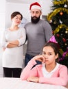 Parents lecturing daughter at Christmas Royalty Free Stock Photo