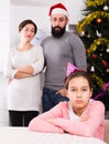 Parents lecturing daughter at Christmas Royalty Free Stock Photo