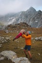 Father playing with daughter outdoor in mountains family travel vacations