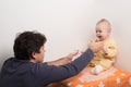 Father is playing with his baby Royalty Free Stock Photo