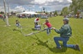 Father playing with his children at a picnic in Lima Montana