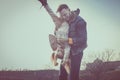 Father playing with his daughter in the park. Daughter lying on Royalty Free Stock Photo