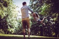 Father playing in the meadow with daughter. Enjoying in s Royalty Free Stock Photo