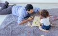 Father playing toys with his little daughter at home Royalty Free Stock Photo