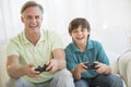 Father Playing Video Game Together At Home Royalty Free Stock Photo