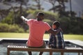 Father pointing something to his son Royalty Free Stock Photo