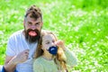 Father posing with lips and child posing with beard photo booth attribute. Gender roles concept. Dad and daughter sits Royalty Free Stock Photo