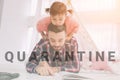 Father reading a book to his daughter while lying on the floor in bedroom. Cute little daughter and her handsome young Royalty Free Stock Photo