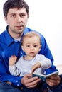 A father reading a book to son Royalty Free Stock Photo