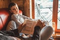 Father reading book to son in cozy country house on a Global Coronavirus COVID-19 pandemic Outbreak days. World 2019Ã¢â¬â20