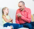 Father rebuking daughter for offence Royalty Free Stock Photo