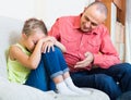 Father rebuking daughter for offence Royalty Free Stock Photo