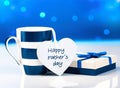 Father`s day blue greeting card,mug and present box with tag.Message Royalty Free Stock Photo