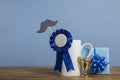 Father's day coffee mug with blue rosette award. Happy father's day concept