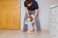 Father`s day concept - Happy family father and baby child son indoors Royalty Free Stock Photo