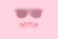 Father`s day concept. Hipster pink sunglasses and funny moustache on pink background