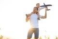 Father's day. dad and baby son playing together outdoors plane Royalty Free Stock Photo