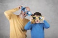 Father`s day,father and son with funny sunglasses