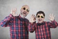 Father`s day,father and son with tie and sunglasses