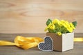 Father's Day gift: Yellow primrose flowers arranged in gift box