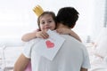 Father`s day. Happy family daughter giving dad a greeting card on holiday. Royalty Free Stock Photo