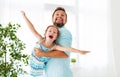 Father`s day. Happy family daughter hugging dad and laughs Royalty Free Stock Photo