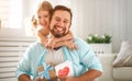 Father`s day. Happy family daughter hugging dad and laughs Royalty Free Stock Photo