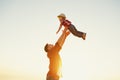 Father`s day. Happy family father and toddler son playing and la Royalty Free Stock Photo